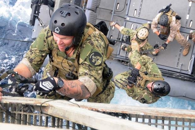 Why Navy SEALs Wear Chuck Taylors in Maritime Operations Military